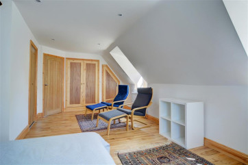 Seating and storage in the main bedroom