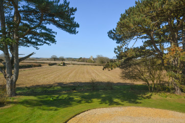 View from Bedroom 1 across the fields to the church