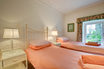 A pretty twin bedded room.
