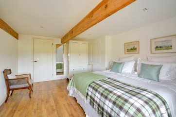 With the luxury of an en-suite, a bright and airy bedroom.