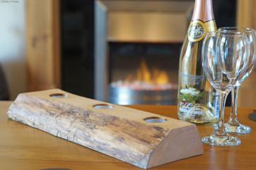 Living room with solid oak floor and comfortable, large leather sofas