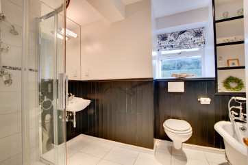 Family Bathroom with slipper bath, separate shower, basin and WC
