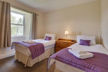 One of the twin bedrooms