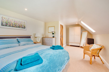 Storage within the spacious main bedroom