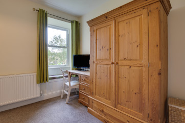 Master bedroom with en suite and TV