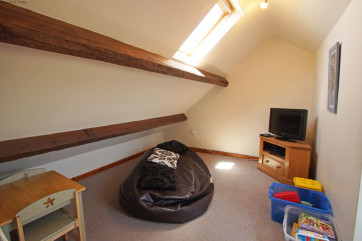 Cosy 'snug' room with TV & games - a perfect retreat for the children.