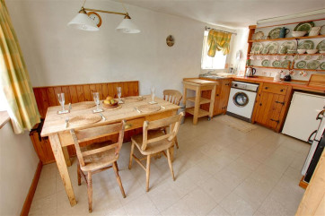 Sit and watch the chef in the spacious kitchen