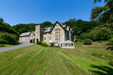 Sheplegh Court was constructed in the early 1800's and is set in 22 acres of beautiful tranquil grounds nestling in the folds of a lovely valley with extensive gardens, woods, parkland and views across glorious South Devon countryside. 