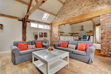  Open Plan Living Room with exposed beams and brickwork
