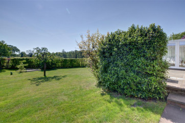 This well tendered rear garden with plenty of space and lawns makes for a great stay come rain or shine.