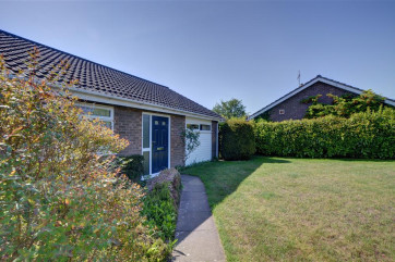 Midda Beck is a delightful single story property with to the front and rear.