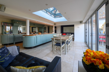 Kitchen and breakfast area with large bifold doors