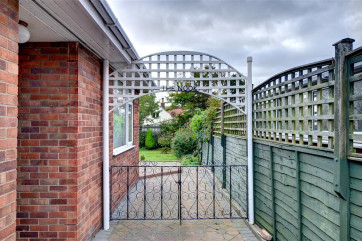The gate to the garden and the main entrance to the house.