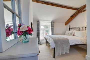 The master bedroom is decorated in calming colours 