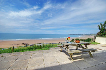 Enjoy al fresco dining after a fun day at the beach on this wonderful terrace