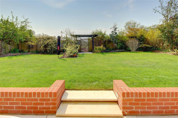 A plush spacious garden will allow for relaxation as well as playtime.