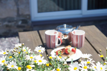 The patio is perfectly located to capture the sea & countryside views