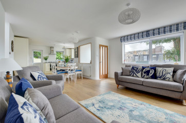 A beautiful seaside themed open plan living and dining area