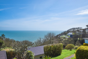 Gardens of the property with spectacular views over Start Bay