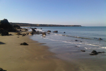 Traeth Penllech - a long sandy beach just 2 miles from the cottages
