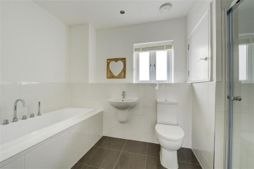 Large family bathroom with separate shower