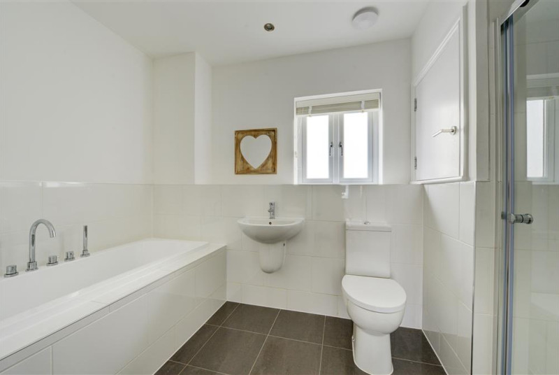 Large family bathroom with separate shower