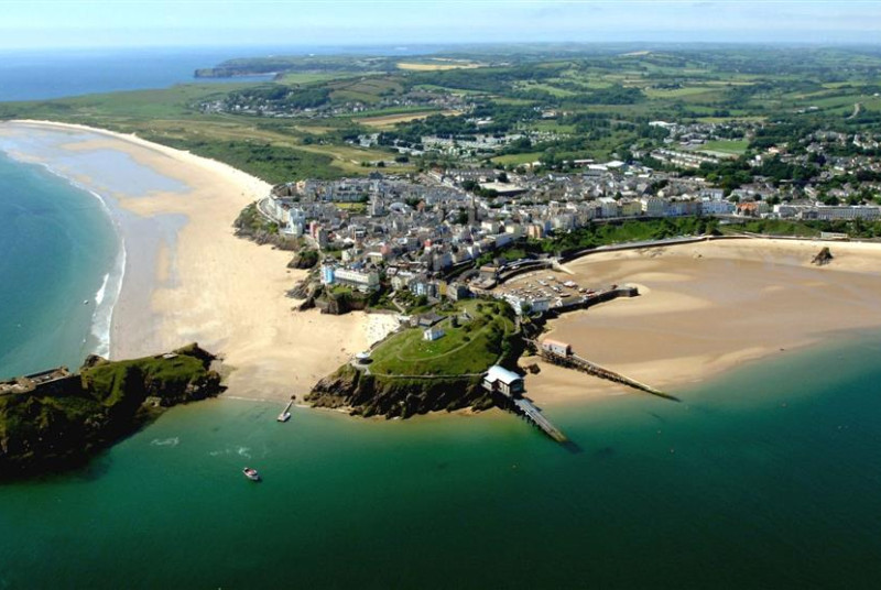 An aerial view of Tenby showing the beautiful beaches and colourful town.