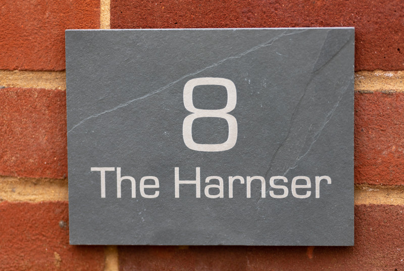 The Harsnser - Nameplate