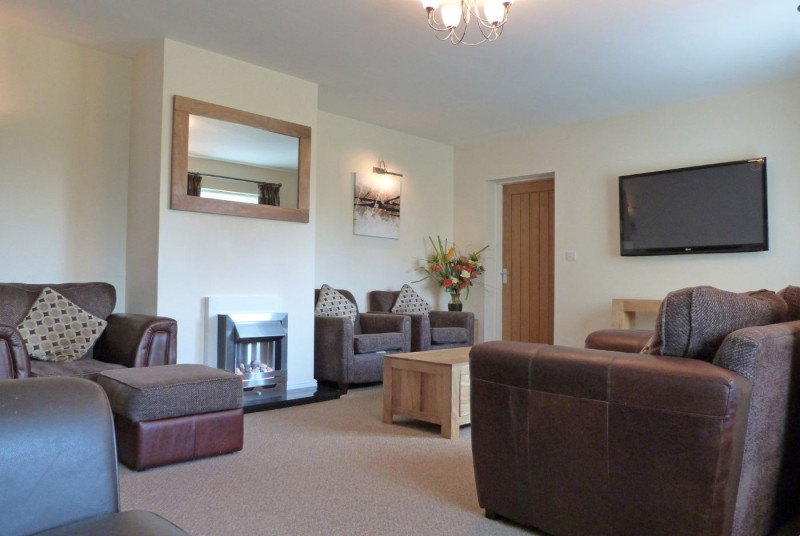 Spacious lounge includes gas fire, 50