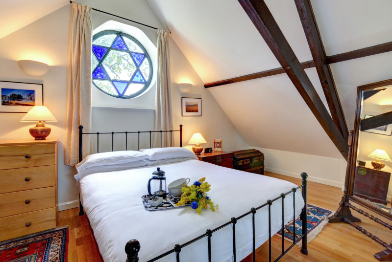 Double Bedroom with ornate window