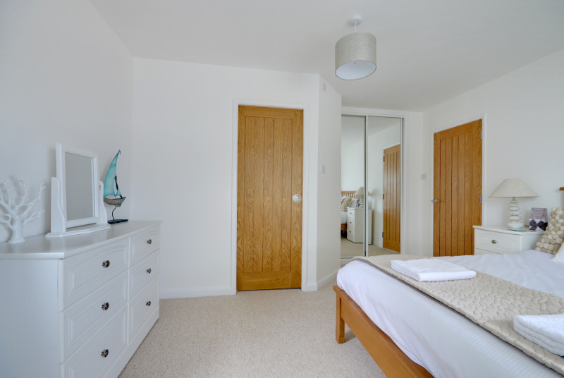 Beautifully decorated bedroom with modern ensuite bathroom