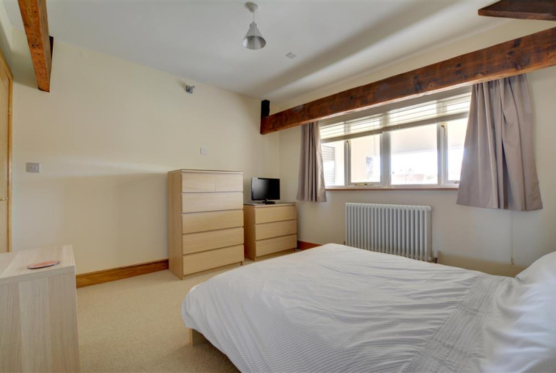 Double Room with wooden chest of draws