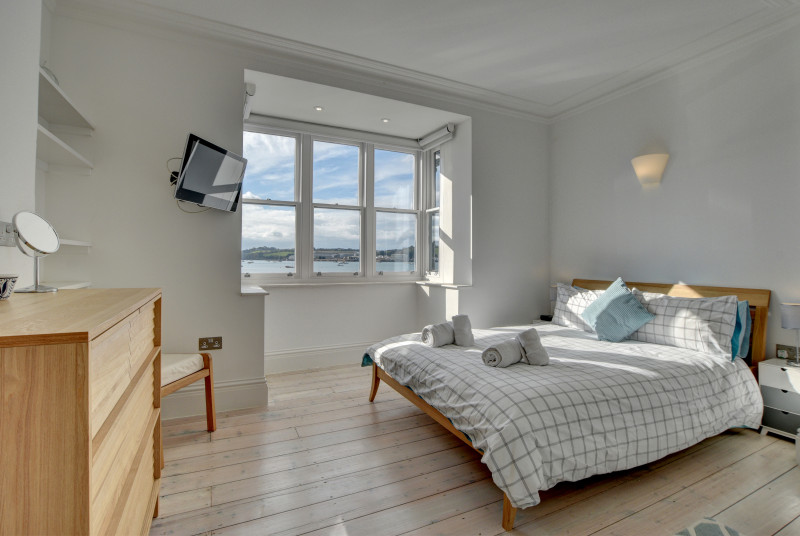 Light and bright double bedroom with sea views