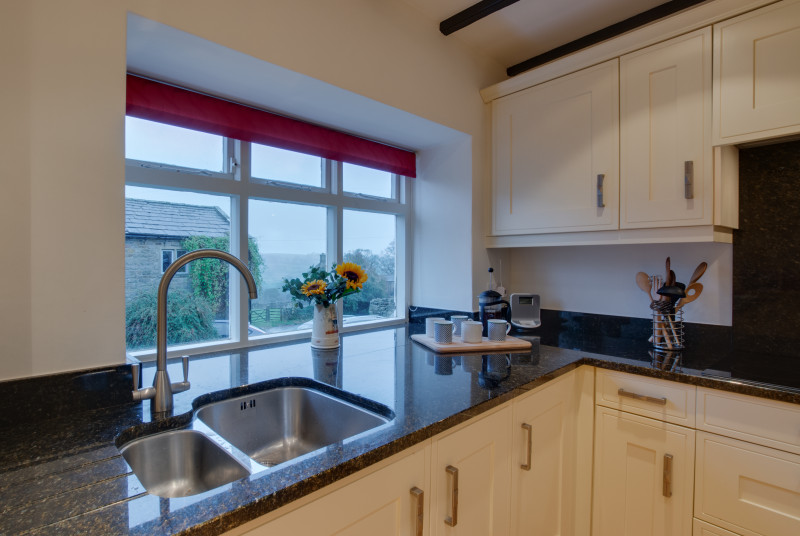 Well equipped kitchen with views down the valley