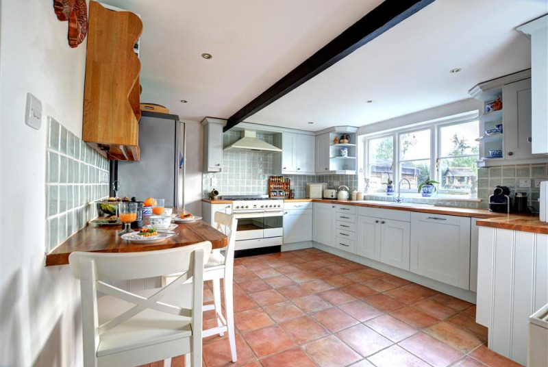 Large family kitchen with utility room off