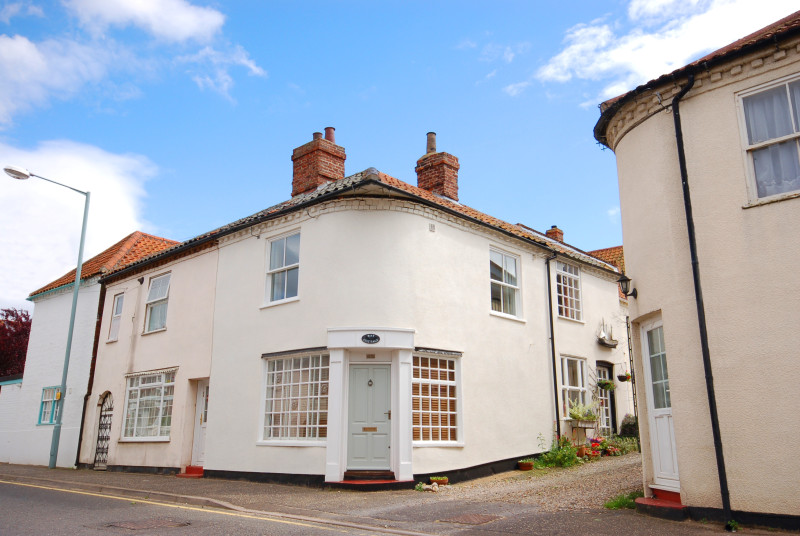 Exterior view of Bay Cottage which is only a short walk from the quay side. 