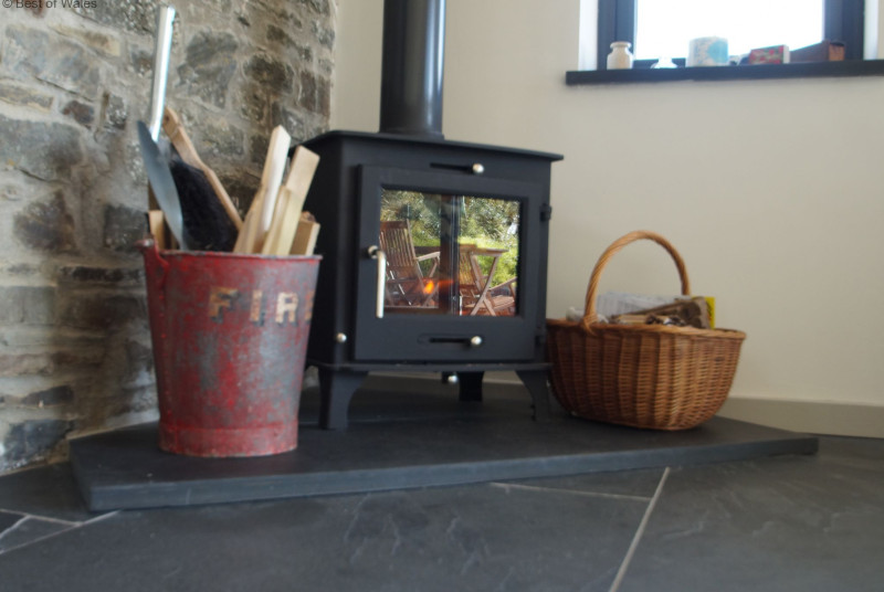 Enjoy a cosy night on the sofa in front of a welcoming woodburner