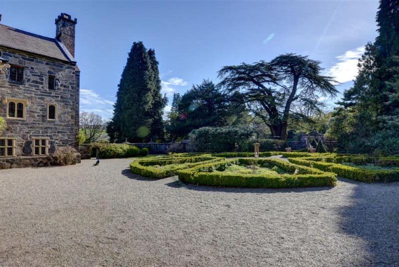 The attractively landscaped grounds are also home to several peacocks