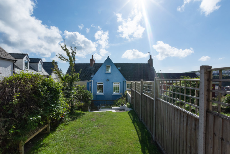 Woodbine Cottage has a landed garden.