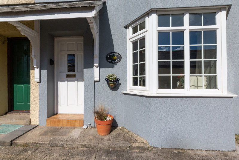 A view of Woodbine Cottage front door in coastal village of Saundersfoot.