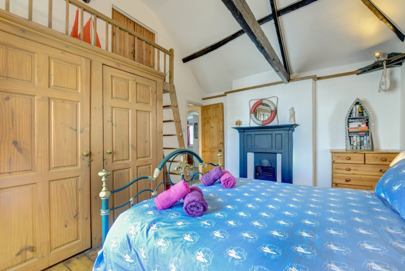 Master Bedroom: Double bed with underneath storage.