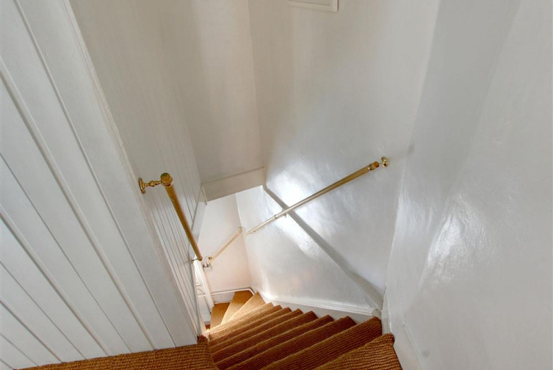 Fairly steep staircase to the first floor.