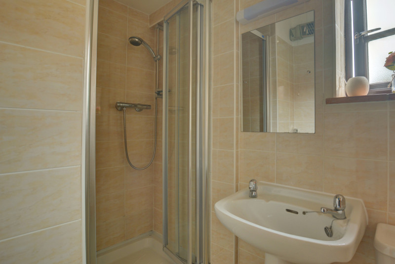 Modern en-suite shower room with shower cubicle