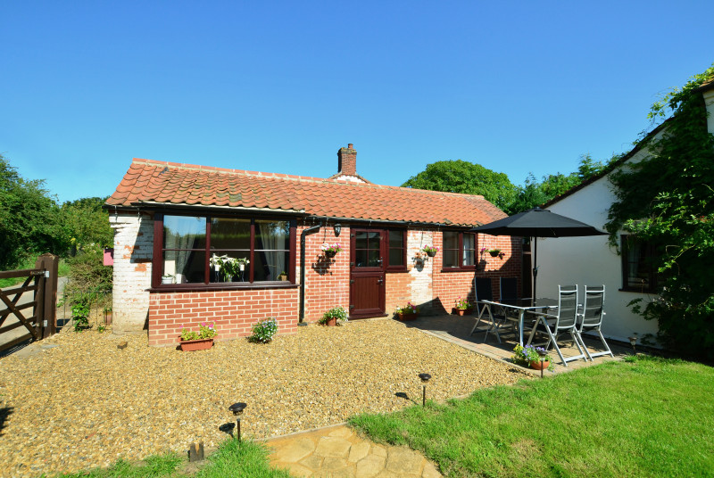 Holly Cottage stands at the front of the owner's home; the property has recently been refurbished and offers cosy, comfortable accommodation on one level. Fully enclosed garden with lawn, patio, barbecue, table and chairs