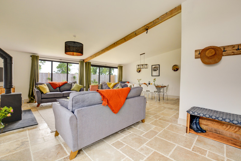 Open Plan Living Room showing comfortable seating and Dining Area