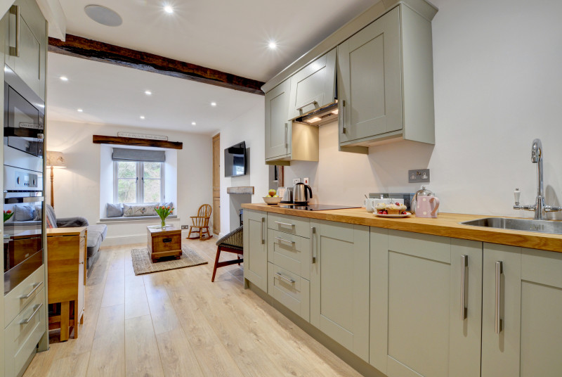 A stylish kitchen area has been well designed and offers all you need to enjoy preparing meals