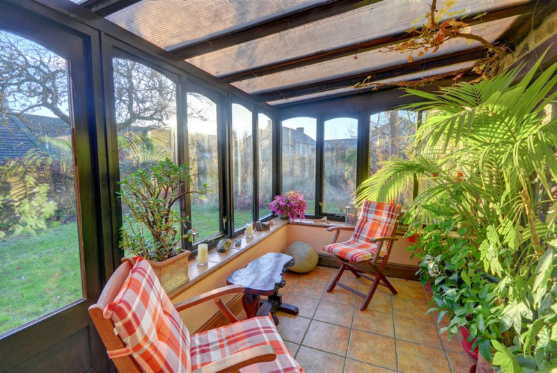 The conservatory with stunning views of the garden.