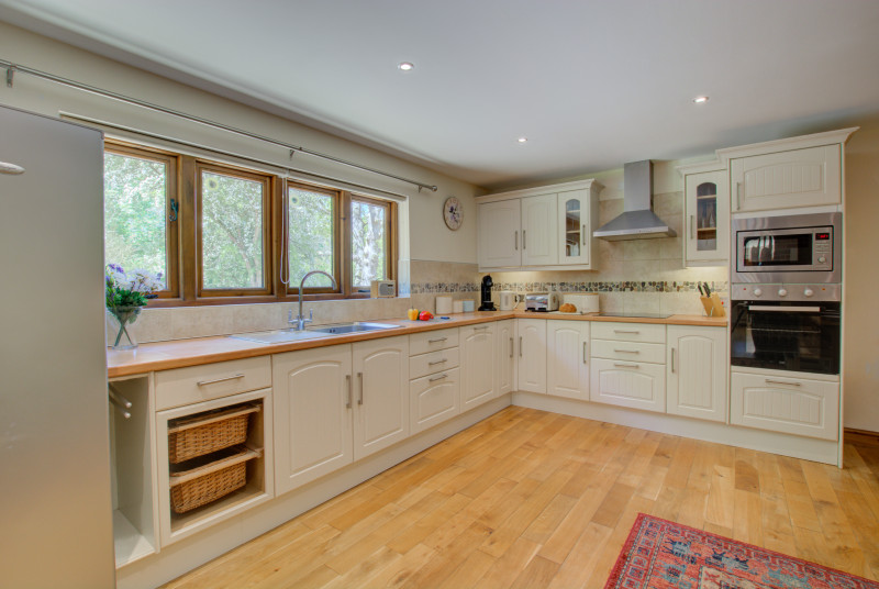 Large fridge/freezer. Electric hob and oven.