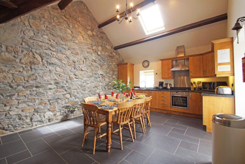 Double height room with open beams creates a great sense of space