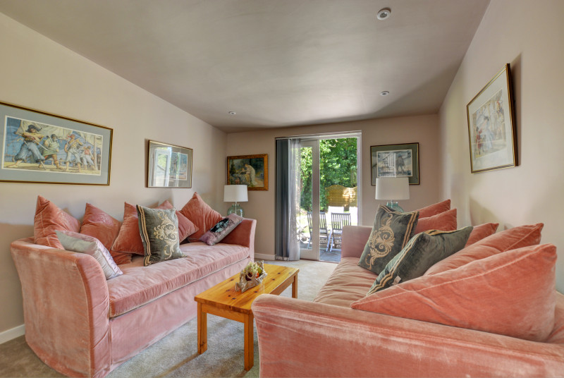Sitting Room with comfortable seating, coffee table